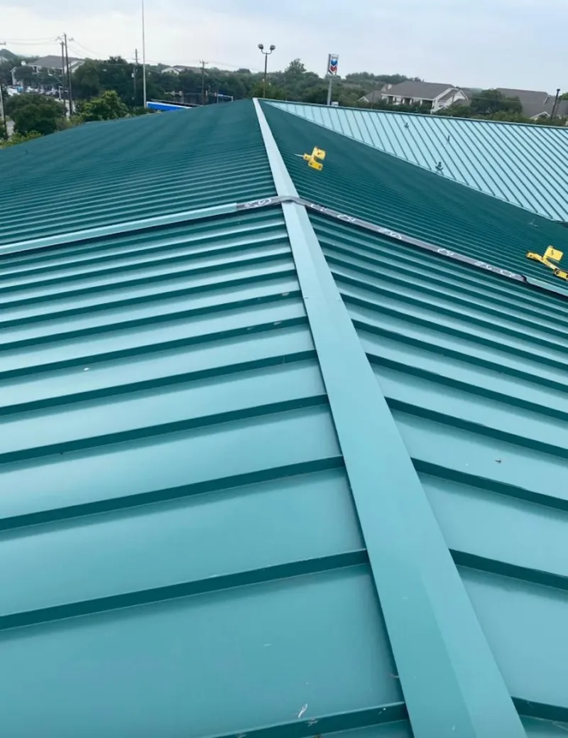 Green commercial metal roof ridge and valley for Metal Roof Repair in Lehman